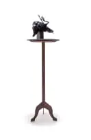 Rina Stutzer, The Collector, bronze with a black patina, granite and steel, on a steel base