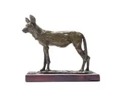 Arend Eloff, Wild Dog, resin with bronze dust, on a wooden base