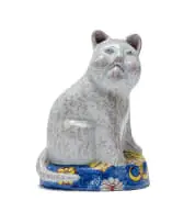 Hylton Nel, Cat on a blue and yellow base, painted and glazed ceramic