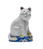 Cat on a blue and yellow base by Hylton Nel, painted and glazed ceramic, sold Feb 2025