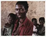 Guy Tillim, Rosalina Nahamba Holding Baby Filomena Lasinda. Her Daughter, Rosali Sindali Holds Baby Guerra, archival pigment ink on 300g coated cotton paper