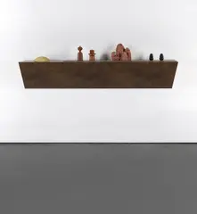 Haim Steinbach, landscape A-1, 2009, plastic laminated wood shelf with plastic reptile cave, 2 wood and metal Dansk salt and pepper shakers, shale mountain and 2 rubber dog chews