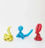 Three works: (i) Balloon Swan (Yellow) ; (ii) Balloon Rabbit (Red) ; (iii) Balloon Monkey (Blue) by Jeff Koons, 2017, mirror-polished stainless steel with transparent color coating, sold May 2019