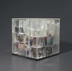 Untitled by Arman, 1965, Plexiglas and matchboxes, in 2 parts, sold Sep 2019