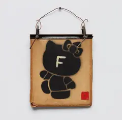 Tom Sachs, F-You, 1996, cardboard, duct tape, wire, vinyl, spray paint, nail polish, and vice grips
