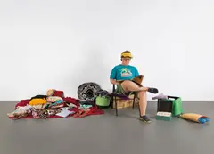 Duane Hanson, Flea Market Lady, 1990, polychromed bronze, textile, newspaper, found objects and metal folding chair