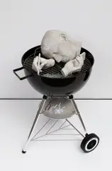 Josh Kline, You're Fired, 2015, concrete, grill, shredded office documents and charcoal