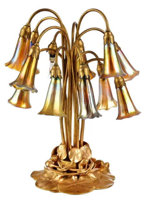 Tiffany Studios, Twelve-Light Gilt Bronze Lily Lamp, twelve assembled floriform iridescent glass shades
