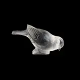René Lalique (French, 1860-1945), A 'Moineau' Paperweight, Designed 1925 by René Lalique, glass, etched R, sold Oct 2025