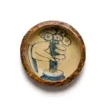 Plate with a hand holding a bouquet of flowers by Hylton Nel, painted and glazed ceramic, sold Sep 2024