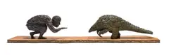 Robert Rorich, Pangolin Boy, bronze with a brown patina on a wooden base