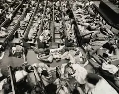 David Goldblatt, Zimbabwe Refugees Given Shelter in the Central Methodist Church, Johannesburg, 2009, silver gelatin print