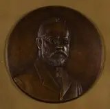 Anton van Wouw, Bas-relief Bust of Dr Herman Breijer, bronze with a brown patina