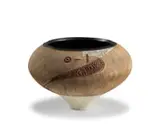 Andile Dyalvane, Scarified conical vessel, 2007, earthenware with blue and black glazed interior, the reverse with red-glazed highlights