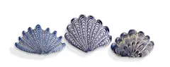 Lucie de Moyencourt, Curated collection of three glazed ceramic shells with blue motifs