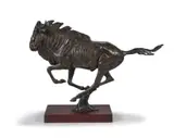 Arend Eloff, Galloping Wildebeest, bronze on a wooden base