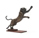 Arend Eloff, Leaping Leopard, bronze with a brown patina on a wooden base