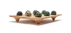 Cobus Haupt, Boa Skulls, bronze with various patinas, on a wooden base