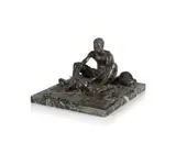 Anton van Wouw, The Mieliepap Eater, bronze with a dark brown patina mounted on a marble base