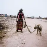 Abdullahi Mohammed with Mainasara, Lagos, Nigeria, 'Gadawan Kura' - The Hyena Men Series II by Pieter Hugo, 2007, c-print, sold Mar 2024