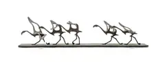 Flamingos by David Tomlinson, bronze with a brown and green patina, offered Oct 2023