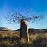 Strijdom van der Merwe, Clouds I: Collecting wire in the Sneeuberg Conservancy and placing it on top of a Rock, photograph on paper