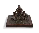 Anton van Wouw, The Mealiepap Eater, bronze with a brown patina on a wooden base