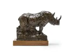 Rhino by Jo Roos, bronze with brown patina, on a wooden base, sold Jul 2023