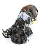 Tawanda Takura, Zvino muchatiikp (2), 2021, Found objects: Old shoes and tongues, bearer notes, surgical mask, wire, twine