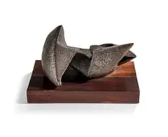Reclining Figure by Edoardo Villa, 1985, bronze, on a wooden base, sold Mar 2023