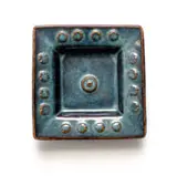 Blue Ashtray by Esias Bosch, stoneware with a blue iron glaze and relief decoration, sold Feb 2023