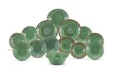A group of Green Plates and a Bowl, with various hand painted motifs, fourteen by Hylton Nel, glazed earthenware, sold Apr 2022