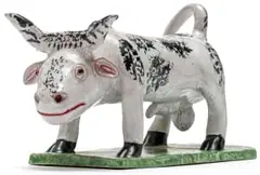 Black and White Spotted Bull by Nico Masemola, painted and glazed ceramic, sold Nov 2021