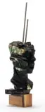 Wim Botha, Head, carved and burnt books with metal rods on a wooden base