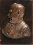Anton van Wouw, Self Portrait, bronze with a brown patina, on a wooden backing panel; cast by the Galizia foundry, London