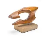 Henry Davies, Pig's Head I, carved wood, mounted on a stone base