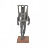 Jorjana Holden, Man with Cage, 1976, bronze