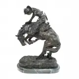 Rattlesnake by Frederic Remington, bronze, sold Apr 2024