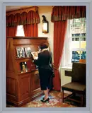Jeff Wall, A woman consulting a catalogue, 2005, transparency in lightbox