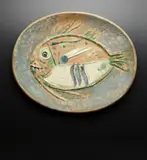 Mottled fish (Poisson chiné) (Chinese Fish) by Pablo Picasso, 1952, White earthenware dish painted in colors with partial brushed glaze; ceramic, Madoura edition, sold Apr 2019