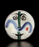 Face no. 130 (Visage no. 130 ) by Pablo Picasso, 1963, White earthenware plate painted in colors, with brushed glaze; ceramic, Madoura edition, sold Apr 2019
