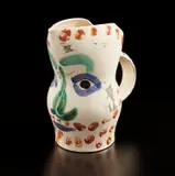 Pablo Picasso, Face with points (Visage aux points), 1969, White earthenware turned pitcher painted in colors, with knife engraving and partial brushed glaze