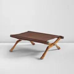 T. H. Robsjohn-Gibbings, "Diphros Okladias" folding stool, model no. 9, designed circa 1937, Walnut, leather, brass