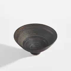 Lucie Rie, Bowl, circa 1973, Porcelain, manganese glaze with concentric bands of sgraffito design repeated inside and out