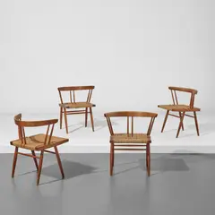 George Nakashima, Set of four "Grass-Seated" chairs, 1962, American black walnut, braided seagrass