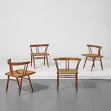 George Nakashima, Set of four "Grass-Seated" chairs, 1962, American black walnut, braided seagrass