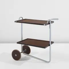 Tea trolley by Gregori Warchavchik, circa 1928, Stained mahogany, chromium-plated steel, rubber, offered Sep 2026
