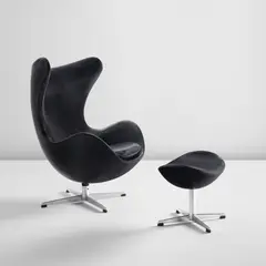 Arne Jacobsen, "Egg" chair, model no. 3316 and ottoman, model no. 3127, designed 1958, produced 1965, Aluminum, rubber, leather upholstery