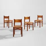 Charlotte Perriand, Set of four "Méribel" chairs, designed 1941, executed circa 1960, Mahogany, straw