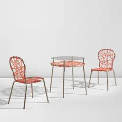 "Zig Zag" table and pair of "Zig Zag" chairs, from L'Est Parisien, Paris by Fernando and Humberto Campana, 2001, Powder-coated stainless steel, PVC tubes, acrylic, sold Sep 2026